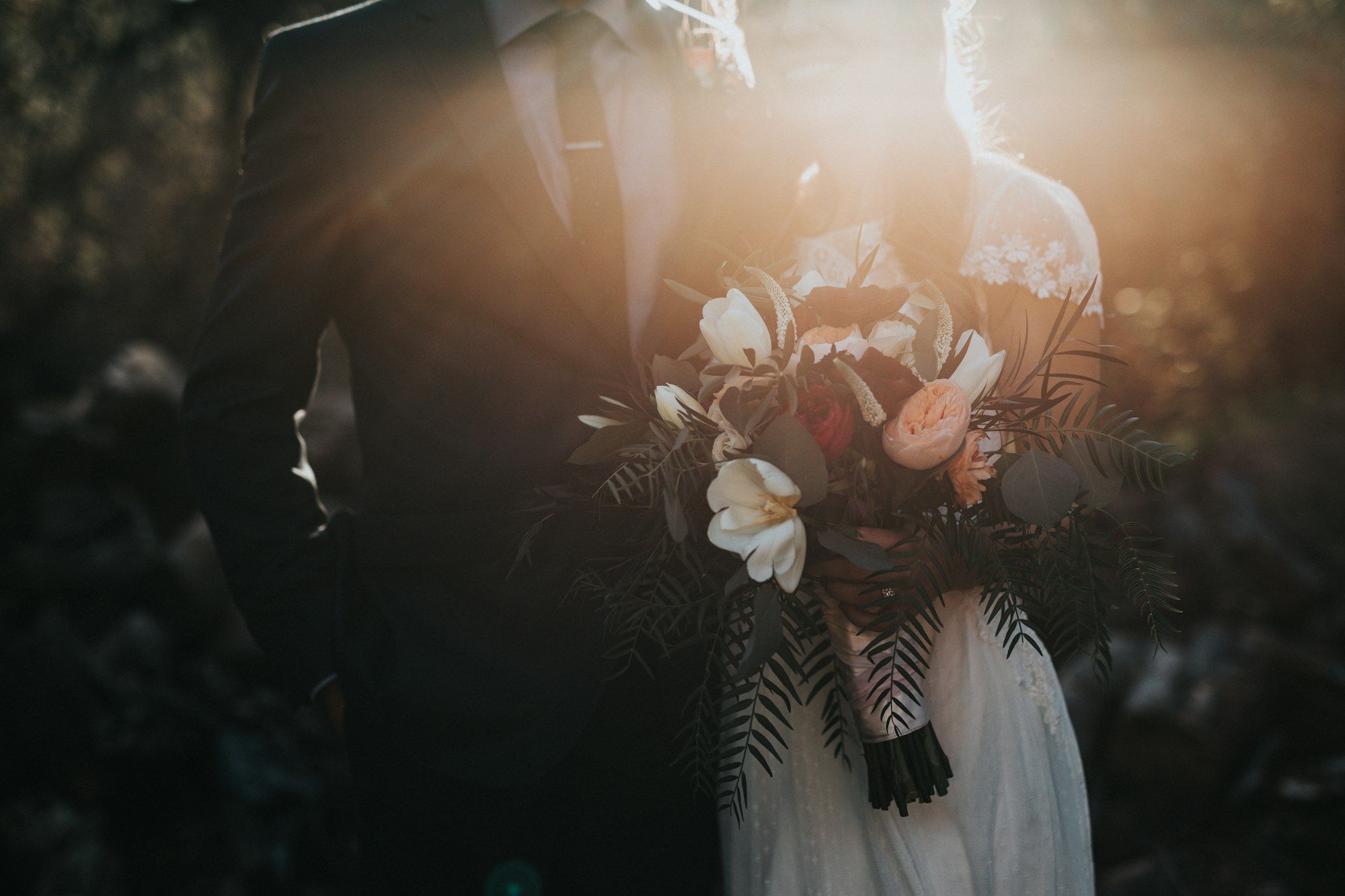 A couple in golden light on their wedding day
